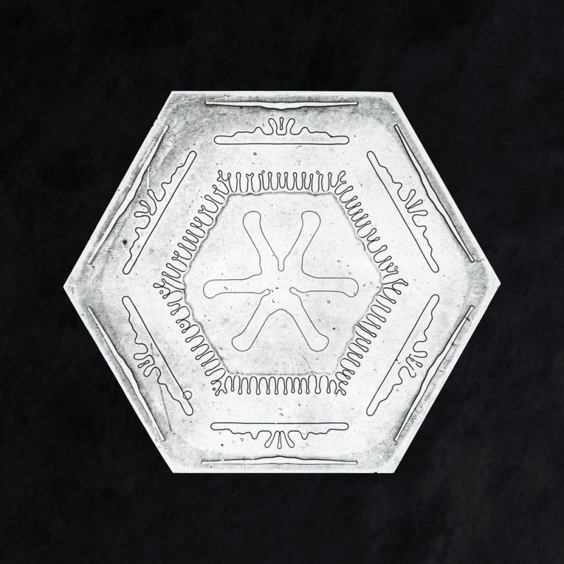 Snowflake reproduction of painting by Wilson Bentley. Photography