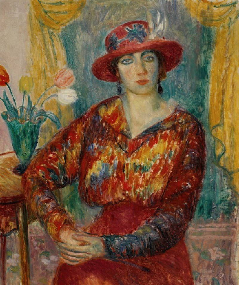 Woman in Red Blouse with Tulips (c. 1913–1914) reproduction of painting by William James Glackens. ALL GICLEE PRINTS